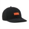 Angled view of the Onyx Blaze Cap featuring perforated side panels and orange Kubota logo patch