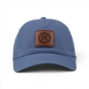 Front view of the Ladies Light Blue Leather Patch Cap featuring a brown leather Kubota heritage patch